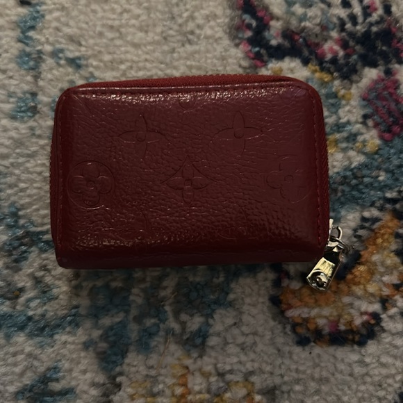 Deep red embossed with imprint detailing accordion zip around wallet - Picture 2 of 4